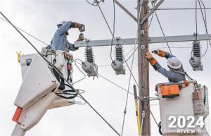 Two PEC lineworkers work together during the Johnson City substation conversion in spring of 2024.